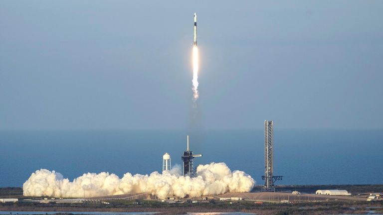 A SpaceX Falcon 9 rocket, with a crew of four aboard the Crew Dragon spacecraft, lifts off on a mission to the International Space Station lifts off from pad 39A at the Kennedy Space Center in Cape Canaveral, Fla., Friday, March 14, 2025. (AP Photo/John Raoux)