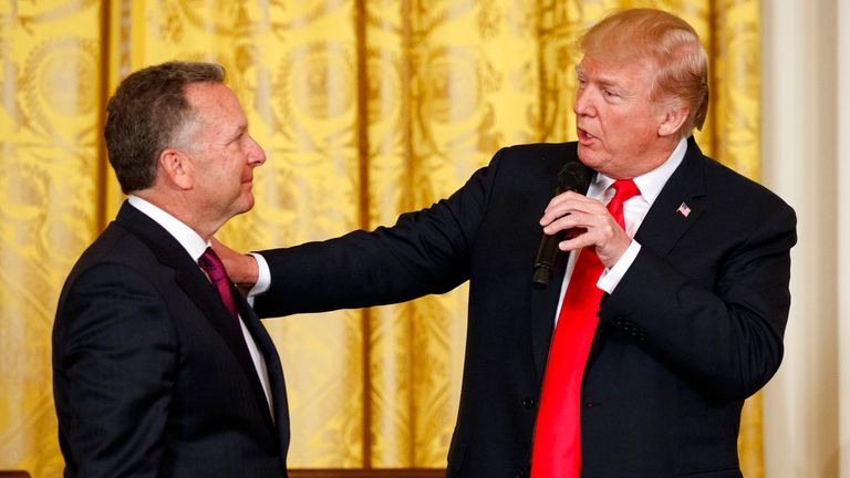 President Donald Trump speaks to businessman Steve Witkoff, who lost his son Andrew to a prescription drug overdose, during the White House Opioid Summit in the East Room of the White House, Thursday, March 1, 2018, in Washington. (AP Photo/Evan Vucci)