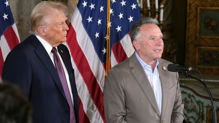 FILE - President-elect Donald Trump listens to Steve Witkoff speak during a news conference at Mar-a-Lago, Jan. 7, 2025, in Palm Beach, Fla. (AP Photo/Evan Vucci, File)