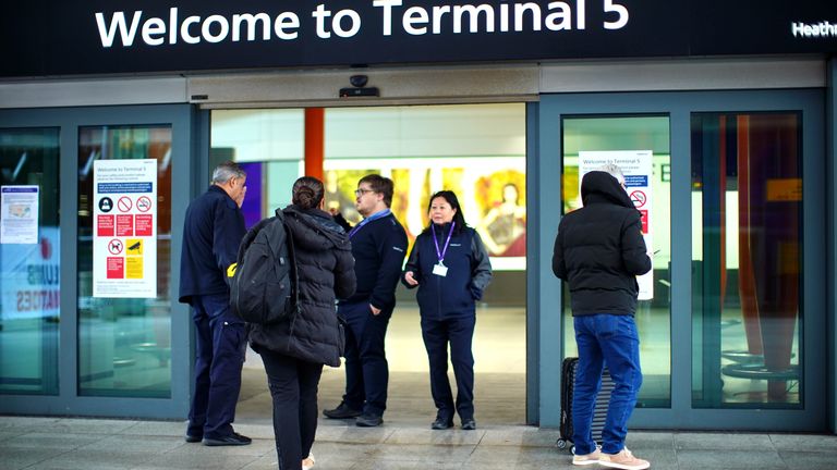 Stranded passengers at Heathrow Terminal 5.
Pic: PA
