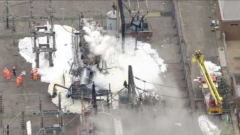 Smoke rises from a fire at electricity substation.