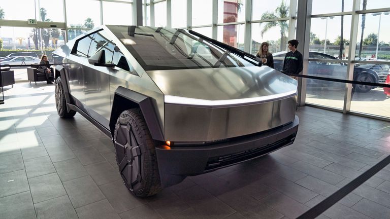 FILE - A Tesla Cybertruck is on display at the Tesla showroom in Buena Park, Calif., Dec. 3, 2023. (AP Photo/Richard Vogel, File)