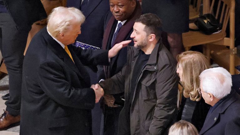 U.S. President-elect Donald Trump shakes hands with Ukraine's President Volodymyr Zelenskiy inside Notre-Dame de Paris Cathedral, ahead of a ceremony to mark the re-opening of the landmark cathedral following the 2019 fire, in Paris, December 7, 2024. LUDOVIC MARIN/Pool via REUTERS