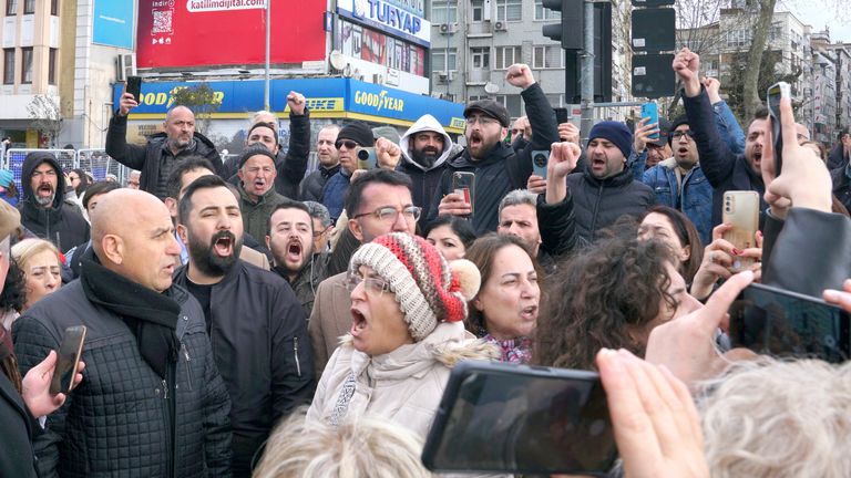 Supporters of Istanbul Mayor Ekrem Imamoglu shout slogans as they gather near the city's police headquarters in Istanbul, Turkey.  Pic: Reuters  