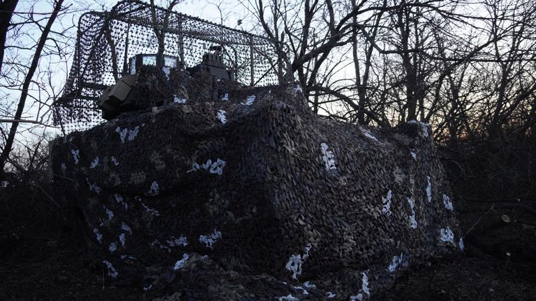 A US-supplied Bradley infantry fighting vehicle covered in camouflage 