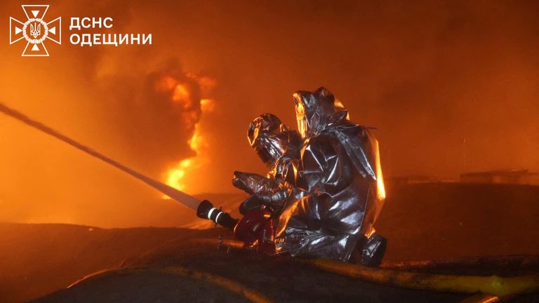 Firefighters work at the site of a Russia drone strike in Ukraine.
Pic: Reuters/Press service of the State Emergency Service of Ukraine