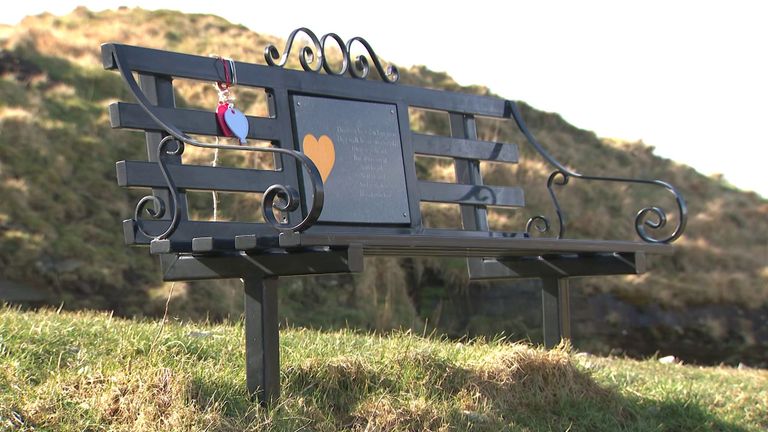 A memorial bench looks out across the Welsh Valleys