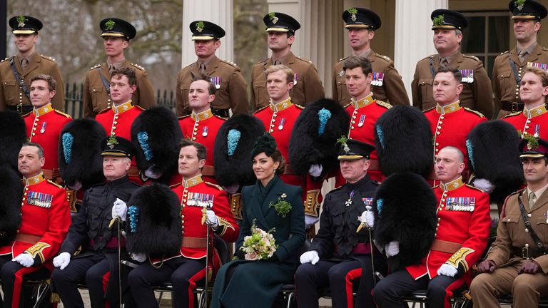 The Princess of Wales poses for a photo with members of the Irish Guards at a special St Patrick's Day parade and celebration at Wellington Barracks.
Pic: AP