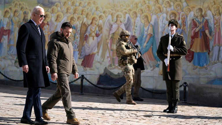 U.S. President Joe Biden walks with Ukrainian President Volodymyr Zelenskiy at St. Michael's Golden-Domed Cathedral during an unannounced visit, in Kyiv, Ukraine, Monday, Feb. 20, 2023. Evan Vucci/Pool via REUTERS