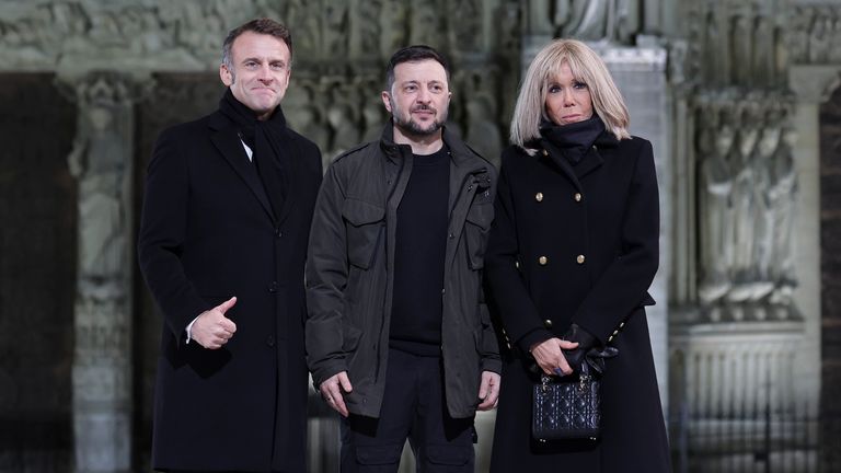 French President Emmanuel Macron and his wife Brigitte with Zelenskyy outside France's iconic Notre Dame Cathedral for it's formal reopening. Pic: AP