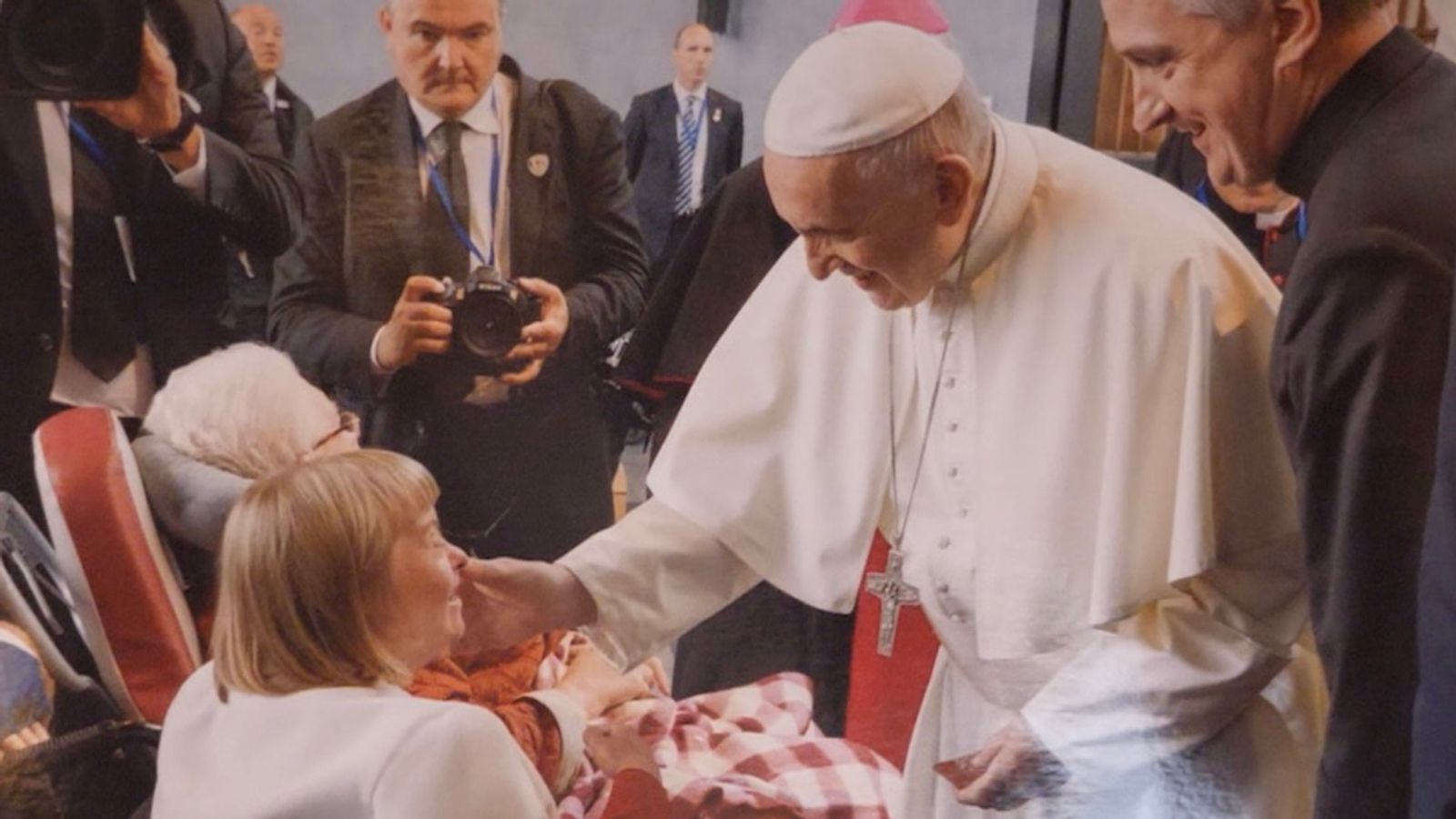 Rain, kisses and lifting a football curse When Pope Francis came to