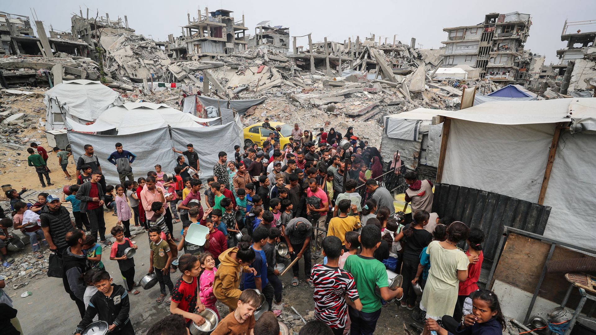 Trump tells Israel 'stop bombing Gaza' - as Hamas agrees to release Israeli hostages, and to parts of peace deal