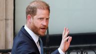 Prince Harry gestures as he walks on the day he is expected to give evidence in his appeal.
Pic: Reuters