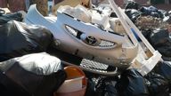 A car bonnet had been left on one rubbish tip
