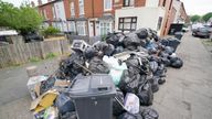 Rubbish bags in Poplar Road in Birmingham.  
Pic: PA