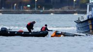 The helicopter ended up submerged and upside down. Pic: Reuters 