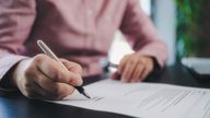 'Can I move my late husband's premium bonds into my name?'