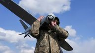 A serviceman of the 68th Oleksa Dovbush Separate Jaeger Brigade of the Armed Forces of Ukraine carries a Leleka reconnaissance unmanned aerial vehicle.
Pic: Reuters