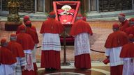  SENSITIVE MATERIAL. THIS IMAGE MAY OFFEND OR DISTURB    Cardinals pay their respects to Pope Francis inside St. Peter...s Basilica at the Vatican, Wednesday, April 23, 2025, where his body will lie in state for three days.     Andrew Medichini/Pool via REUTERS 