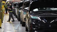 A member of staff works on the production line at Jaguar Land Rover’s factory in Solihull, Britain, December 15, 2022. REUTERS/Phil Noble
