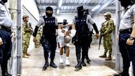 Prison guards escort alleged members of the Venezuelan gang Tren de Aragua and the MS-13 gang recently deported by the U.S. government to be imprisoned in the Terrorism Confinement Center (CECOT) prison, in Tecoluca, El Salvador.
Pic: Secretaria de Prensa de la Presidencia/Reuters
