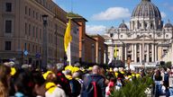 Pilgrims arrive in St. Peter's Square, Wednesday, March 26, 2025, for their jubilee, three days after Pope Francis returned to The Vatican from the hospital where he was treated for bilateral pneumonia. (AP Photo/Gregorio Borgia)