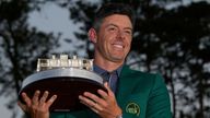 Winner Rory McIlroy, of Northern Ireland, holds the trophy at the Masters golf tournament, Sunday, April 13, 2025, in Augusta, Ga. (AP Photo/David J. Phillip)