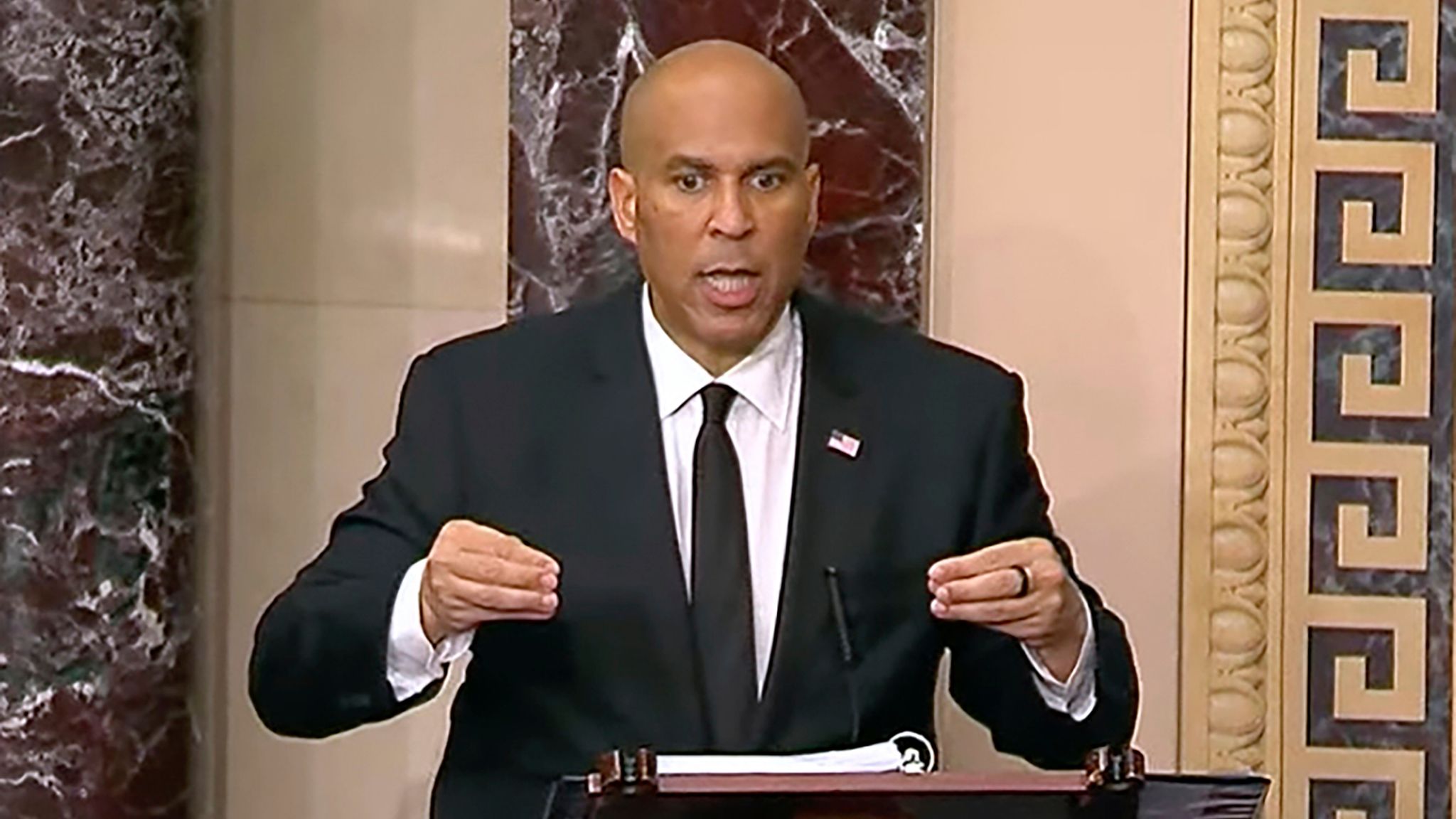 Democrat Cory Booker rails against Trump and Musk in record-breaking