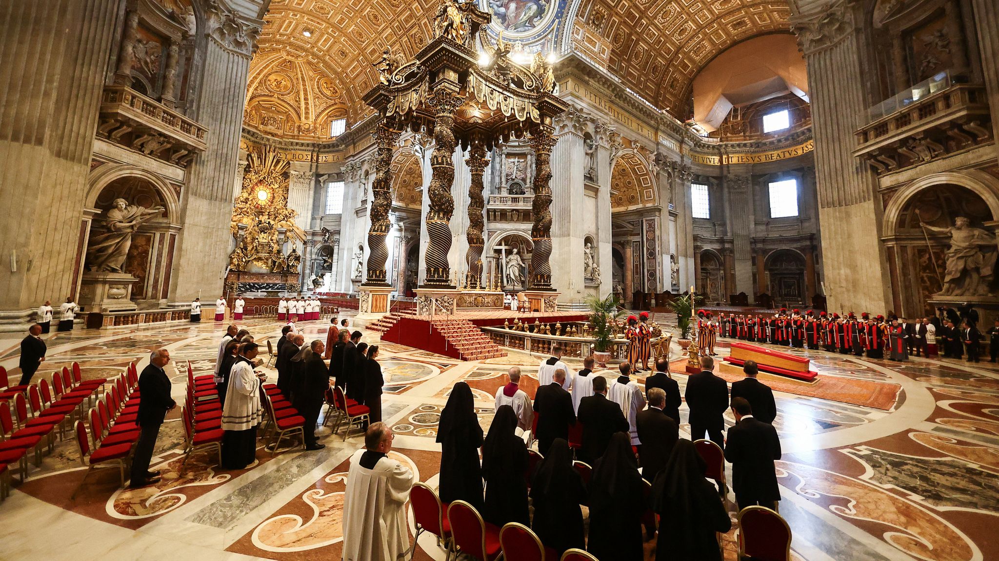 Thousands pay their respects to the pope as he lies in state at st