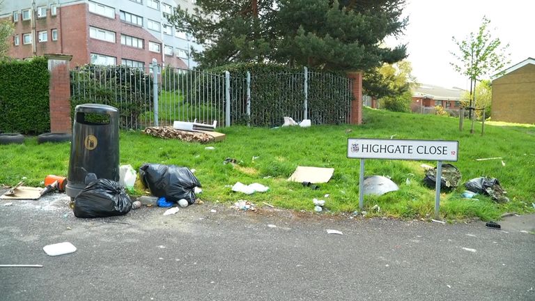 Litter is strewn around residential streets