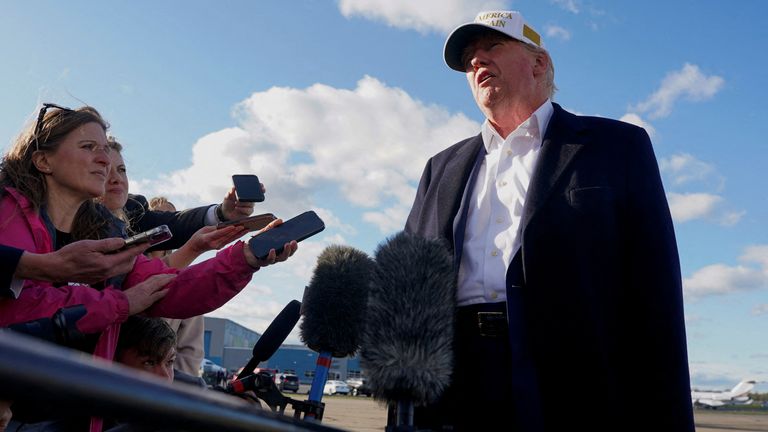 U.S. President Donald Trump speaks to the media before boarding Air Force One en route to Washington, D.C, at Morristown Municipal Airport in Morristown, New Jersey, U.S., April 27, 2025. REUTERS/Nathan Howard