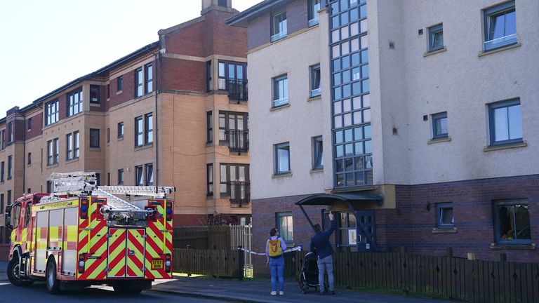 A fire engine at the scene in Barterholm Road, Paisley. Pic: PA