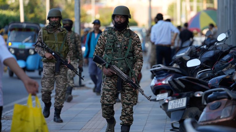 Indian paramilitary soldiers patrol in Srinagar, Indian controlled Kashmir. Pic: AP