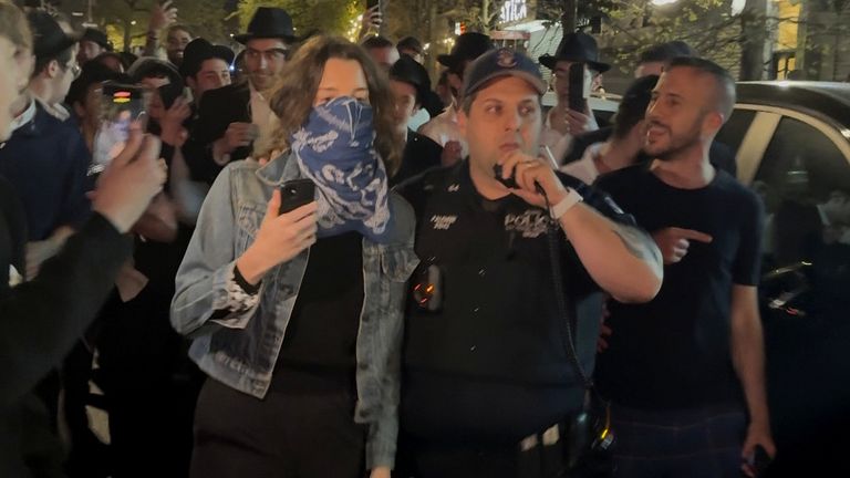 She said she only stepped outside to investigate the noise of the protest, before being set up by the crowd.
Pic: AP