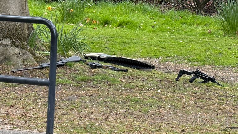 Police said a crossbow and firearm were recovered from the scene