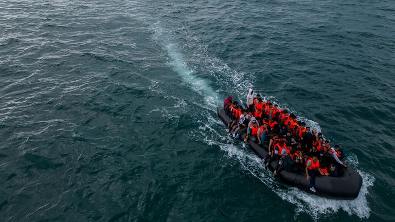 In this drone view an inflatable dinghy carrying migrants makes its way towards England in the English Channel, Britain, August 6, 2024. REUTERS/Chris J. Ratcliffe
