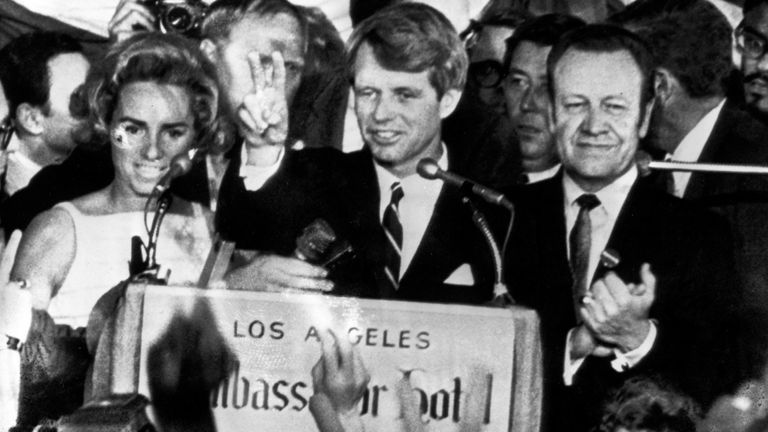 Robert F Kennedy (centre) speaking to campaign workers the day before his death. Pic: AP