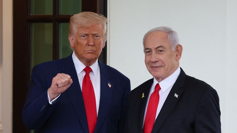 Donald Trump, left, with Benjamin Netanyahu at the entrance to the White House. Pic: Reuters