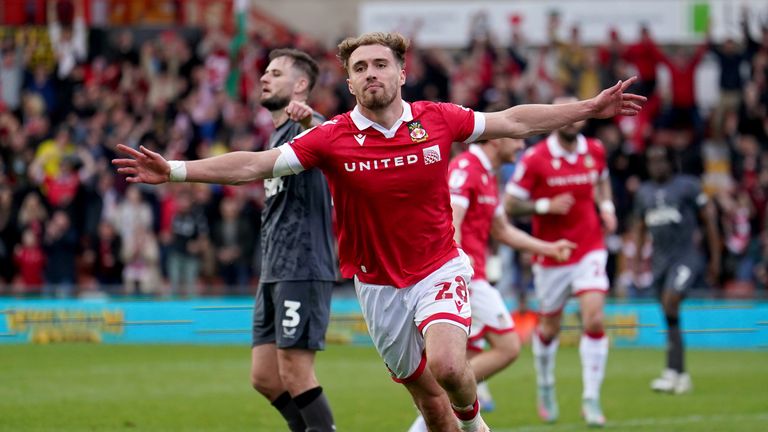 Wrexham's Sam Smith celebrates after scoring his sides third goal during the Sky Bet League One match at SToK Racecourse, Wrexham. Picture date: Saturday April 26, 2025. PA Photo. See PA story SOCCER Wrexham. Photo credit should read: Martin Rickett/PA Wire...RESTRICTIONS: EDITORIAL USE ONLY No use with unauthorised audio, video, data, fixture lists, club/league logos or "live" services. Online in-match use limited to 120 images, no video emulation. No use in betting, games or single club/league/player publications.