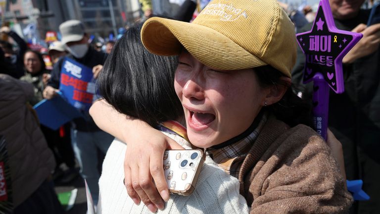 Women celebrate after Yoon Suk Yeol's impeachment. Pic: Reuters