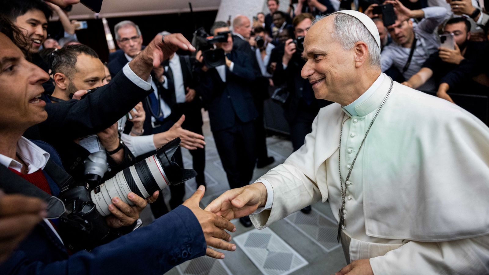 Pope Leo calls for end to polarising 'war of words' in address to media