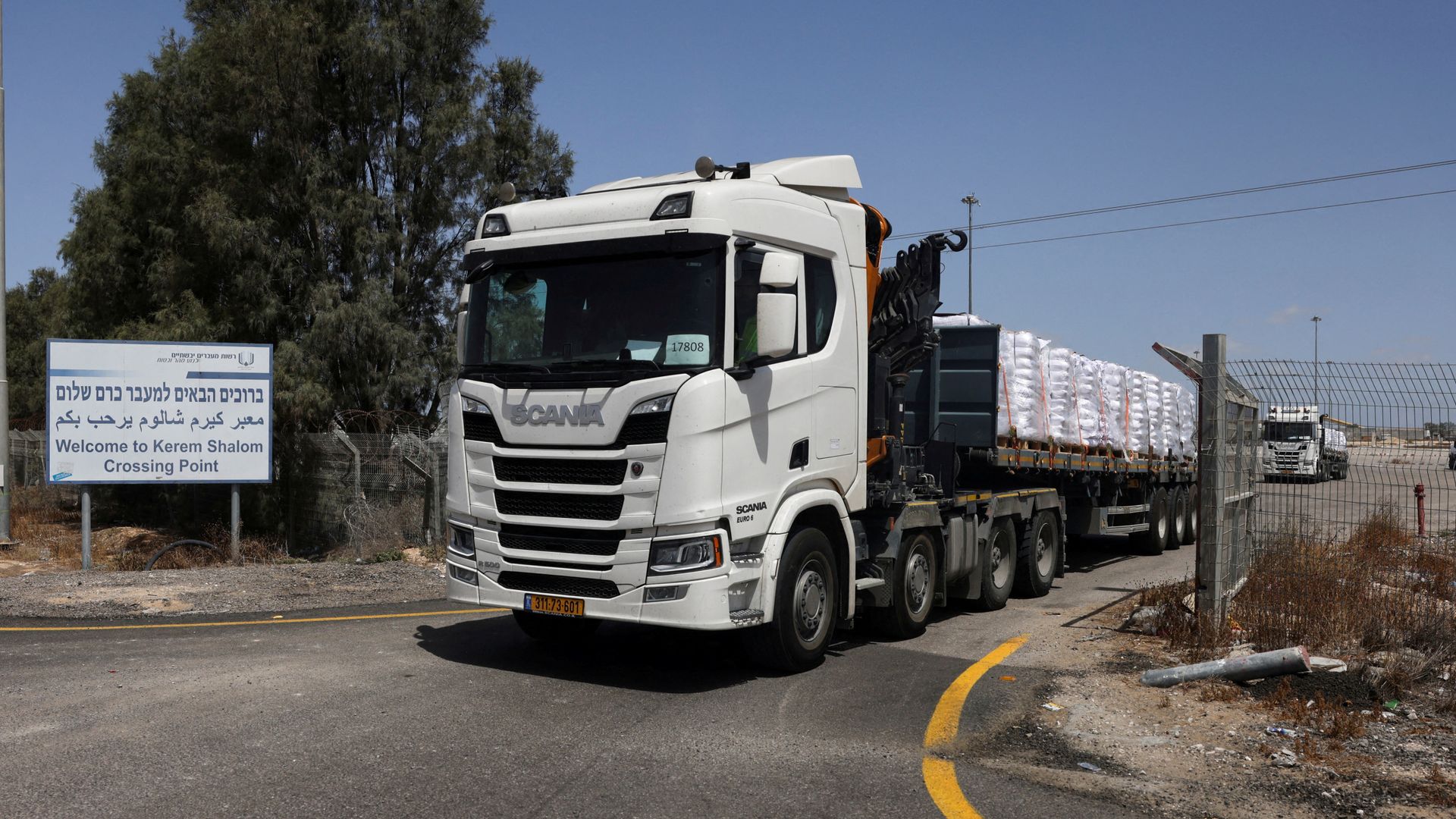 First aid trucks enter Gaza since early March - as UK, France and Canada say its 'wholly inadequate'
