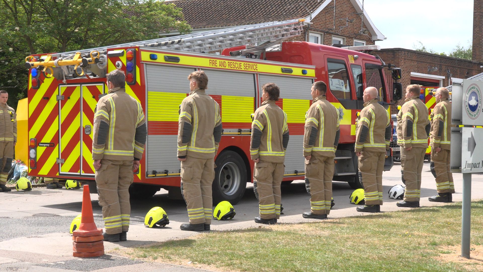 Firefighters form guard of honour after two colleagues and man die in blaze