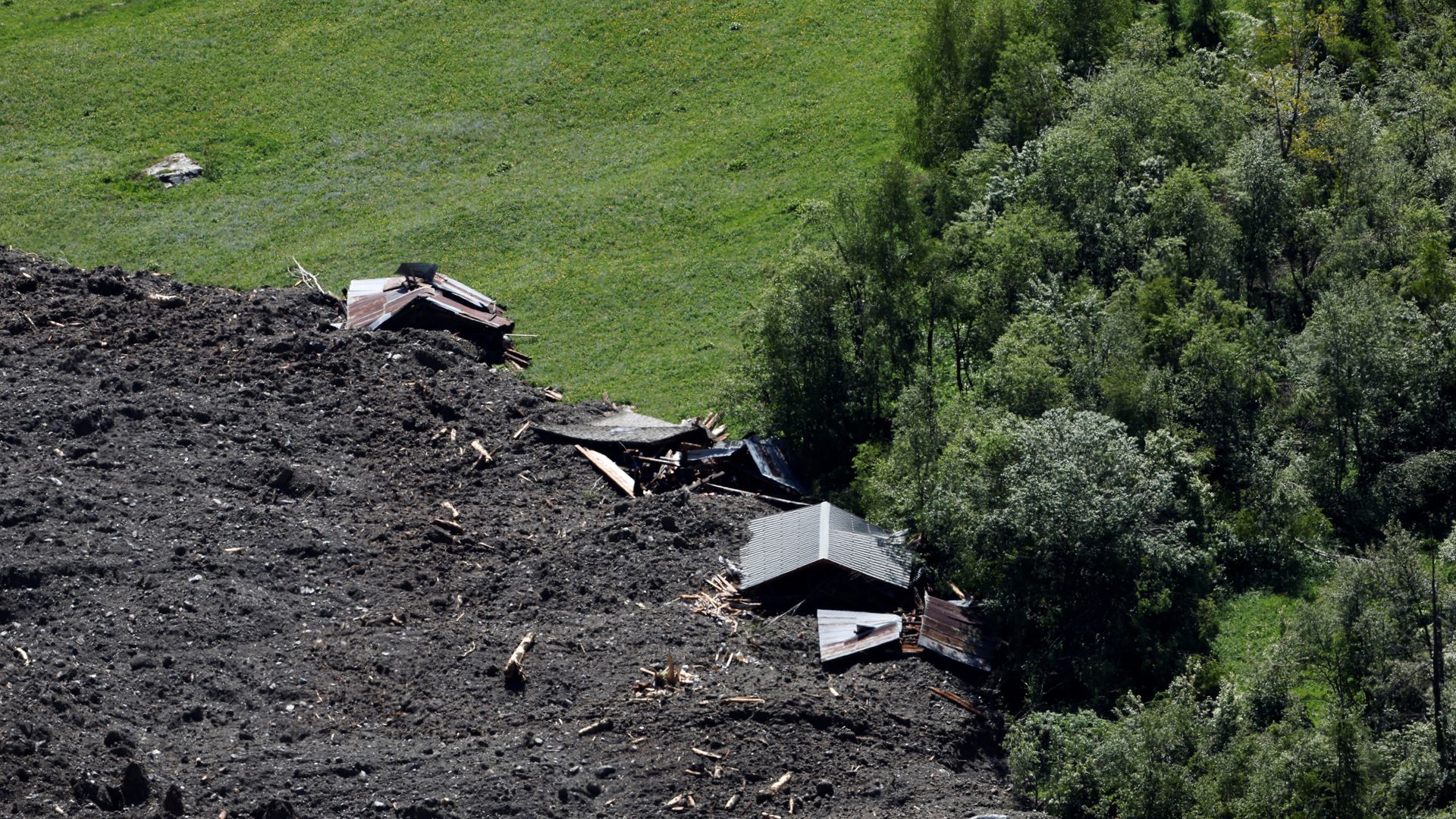 'I lost everything': Residents in shock after landslide buries Swiss village