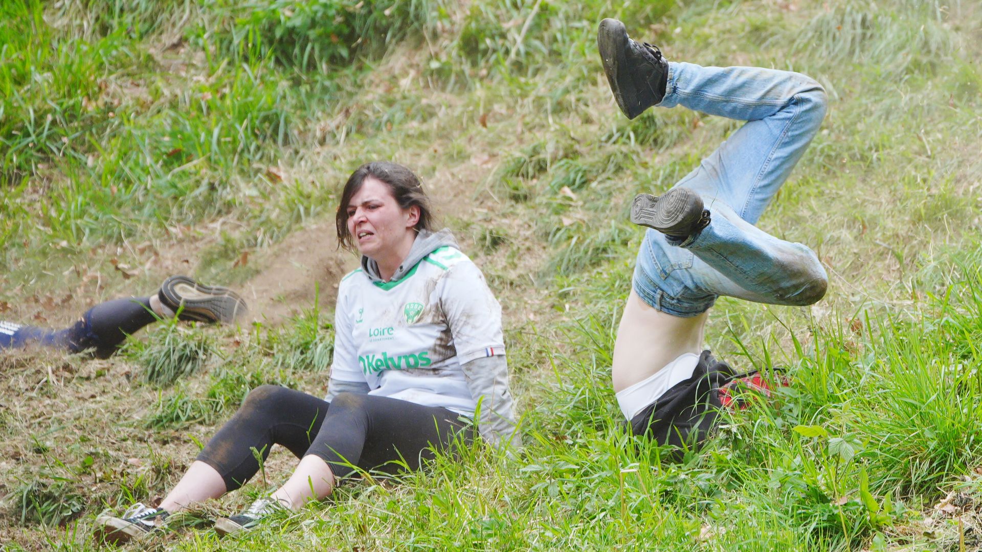 Cheese-loving daredevils hurl themselves down steep hill in famous race