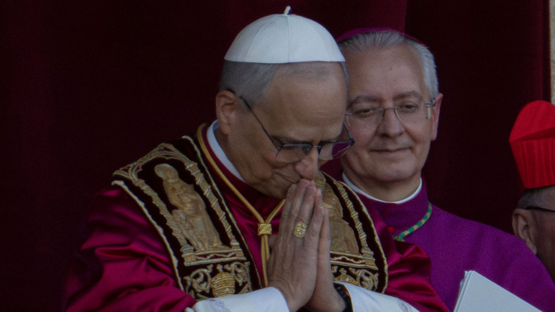 'Peace be with all of you': Chicago-born pope gives first address - and takes the name Leo XIV