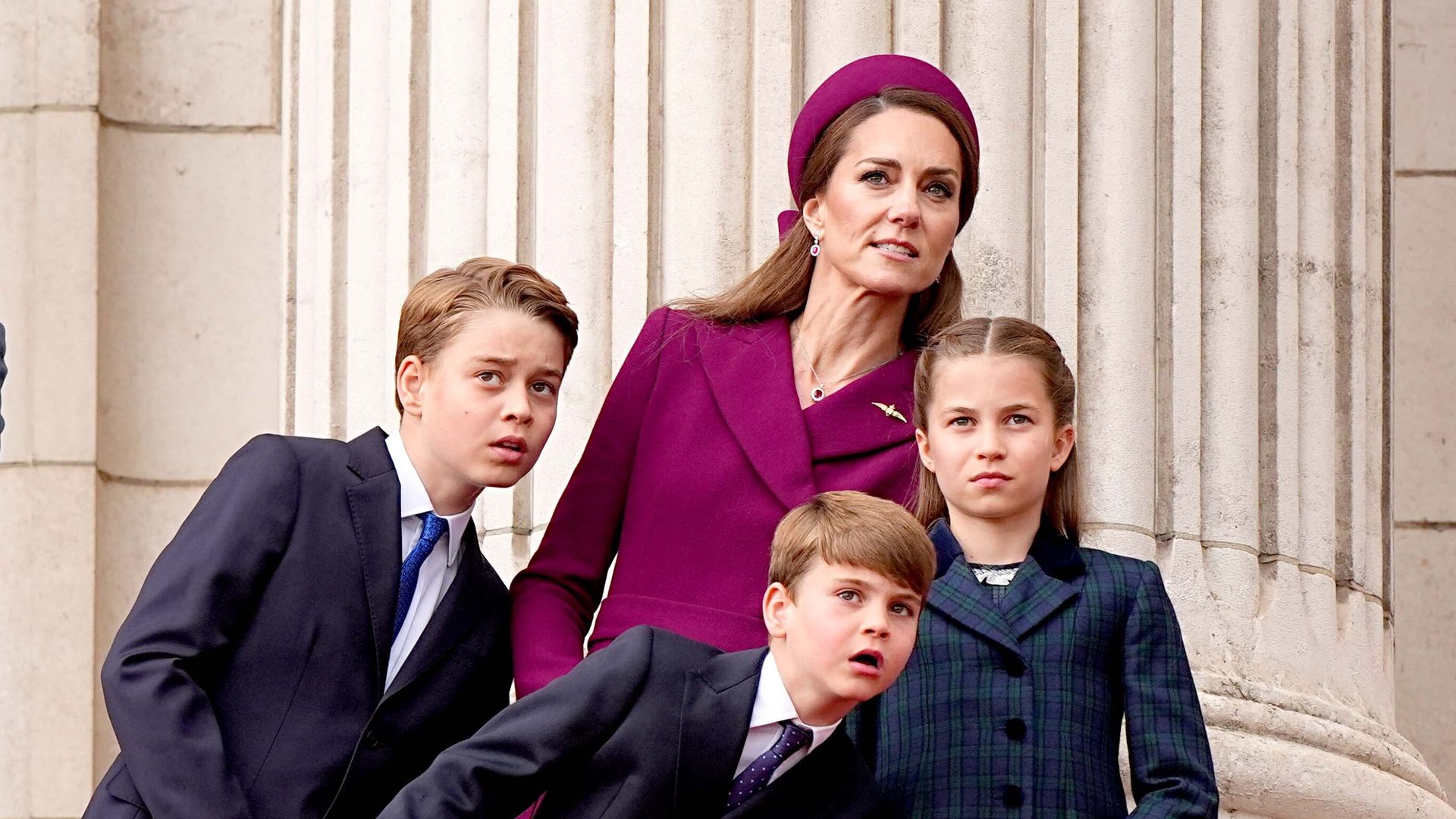 Royals watch flypast as thousands line streets for VE Day parade