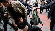 Plain-clothed police members detain a protester, as people attempt to defy a ban and march on Taksim Square to celebrate May Day in Istanbul, Turkey May 1, 2025. REUTERS/Umit Bektas
