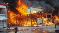 Firefighters work at the site of the Barabashovo market hit by Russian drone strike, amid Russia's attack on Ukraine, in Kharkiv, Ukraine May 6, 2025. REUTERS/Viktoriia Yakymenko