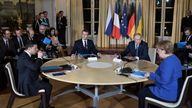 Russian President Vladimir Putin, French President Emmanuel Macron, German Chancellor Angela Merkel and Ukrainian President Volodymyr Zelenskiy attend a Normandy-format summit in Paris, France December 9, 2019. Sputnik/Alexei Nikolsky/Kremlin via REUTERS ATTENTION EDITORS - THIS IMAGE WAS PROVIDED BY A THIRD PARTY.